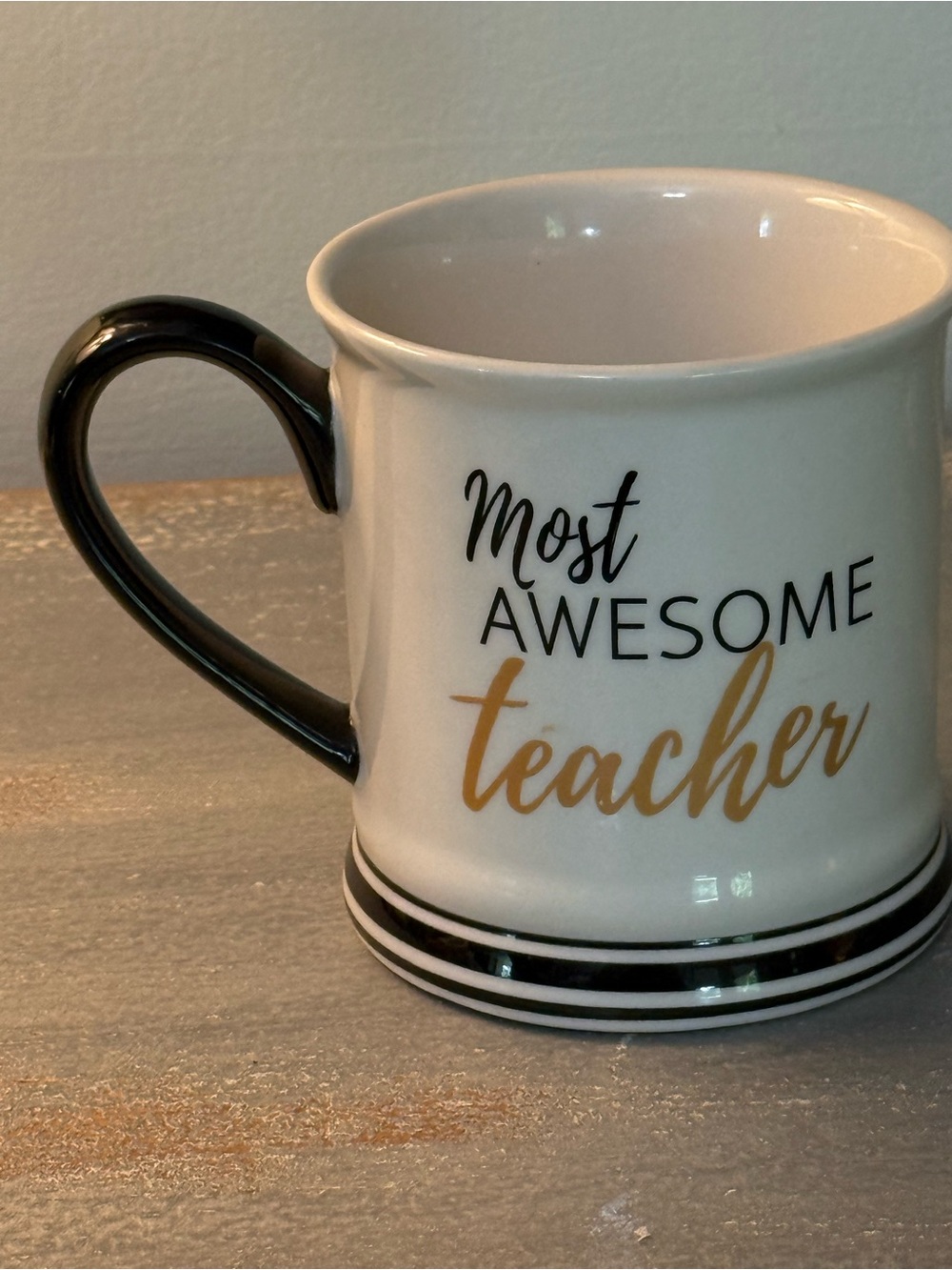 Most Awesome Teacher Ceramic Mug - White with Black Handle and Gold Lettering